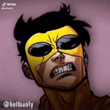 a close up of a cartoon character wearing a yellow mask and sunglasses .