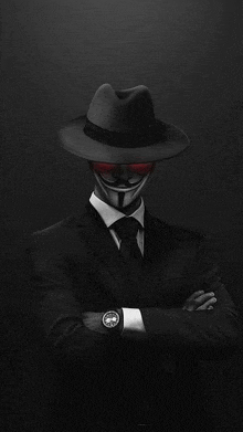 a man in a suit and tie is wearing a anonymous mask and hat .