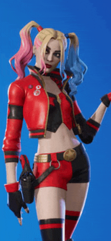 a woman in a harley quinn costume holds a gun