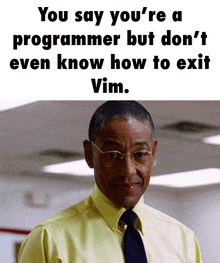 a man wearing glasses and a yellow shirt with a caption that says you say you 're a programmer