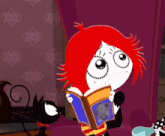a girl with red hair is reading a book