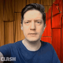 a man in a blue shirt with the word clash on the bottom right