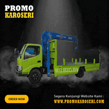 a green truck with a crane attached to it and the words promo karoseri on the bottom