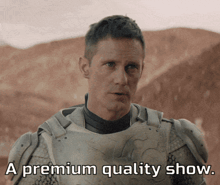 a man in armor with the words " a premium quality show " below him