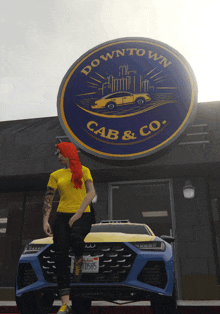 a woman in a yellow shirt sits on the hood of a car in front of a sign for downtown cab & co.