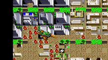 a video game shows a turtle surrounded by flames and buildings