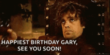 a man is holding a glass of wine and saying `` happiest birthday gary , see you soon ! '' .