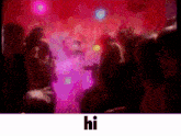 a blurry picture of a crowd of people with the word hi in the corner