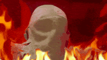a skull is surrounded by flames in a painting