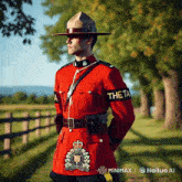 a man in a red uniform has a black armband that says theta