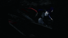 a woman with glasses and purple hair is smiling in the dark