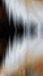 a blurred image of a person 's face with the caption capcut