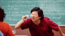 Mr Chow GIF - Mr Chow Squinting GIFs
