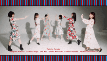 a group of girls are dancing in front of a sign that says " palette parade "