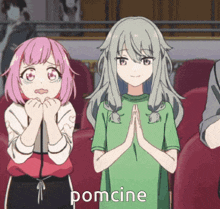 two anime girls are standing next to each other and the word pomcine is on the bottom right