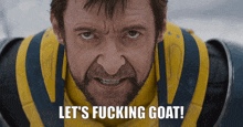 a close up of a man with the words let 's fucking goat below him