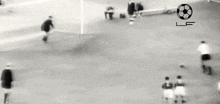 a black and white photo of a soccer game with a lf logo in the corner .