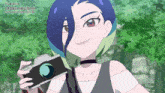 a girl with blue hair is holding a camera