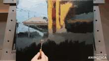 a painting is being painted with a spatula and the words made in animotica are on the bottom