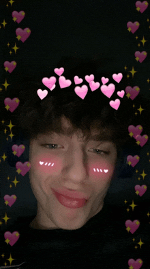 a young man with hearts on his face and a crown of hearts on his head