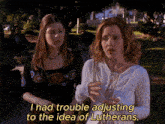 two women standing next to each other with the words i had trouble adjusting to the idea of lutherans below them