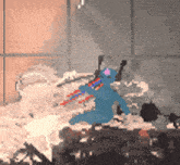 a pixel art of a monster holding a sword in a room .