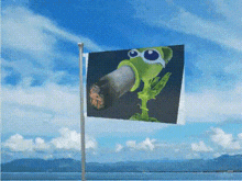 a flag with a picture of a plant smoking a cigarette on it is flying in the wind .