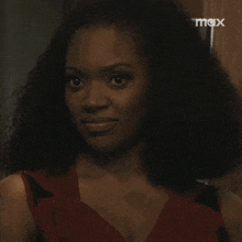 a close up of a woman 's face with the word max on the bottom