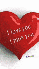 a red heart says " i love you i miss you "