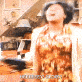 a woman is standing in a room with her mouth open and shouting .