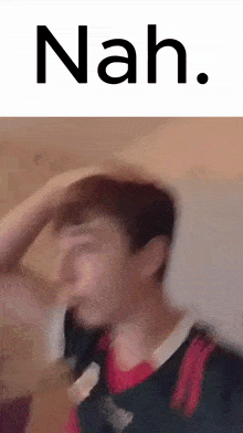 a blurry picture of a man with the word nah on the bottom