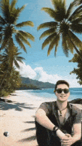 a man wearing sunglasses is sitting on a beach surrounded by palm trees .