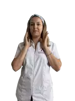 a woman wearing a white robe that says körper