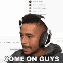 a man wearing headphones and a microphone says come on guys .