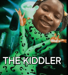 a picture of a girl in a green outfit with the words " the kiddler "