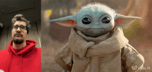a man in a red hoodie next to a picture of the baby yoda
