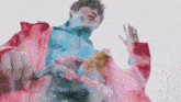 a man in a red jacket is holding a toy gun that says ' nintendo ' on it