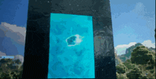 a computer generated image of a portal with a small island in the middle of it