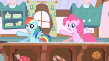 a rainbow dash and pinkie pie are standing next to each other