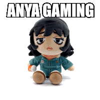 a stuffed doll with the words anya gaming written above it