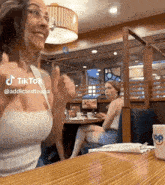 Girl Excited For Food Girl Dancing At Ihop GIF - Girl Excited For Food Girl Dancing At Ihop Girl In Back Staring Her Down GIFs