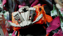a close up of a robot 's arm with a red glove on it