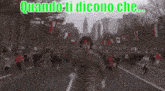 a man is running down a street with a crowd behind him and the words quando ti dicono che