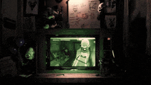 a person 's back is shown in a blurry photo with a light shining on it .