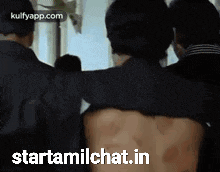 a picture of a man 's back with the words starttamilchat.in written below it