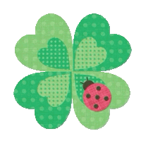 a ladybug is sitting on a green clover with polka dots