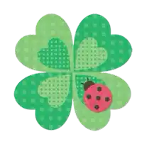 a ladybug is sitting on a green clover with polka dots