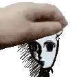 a hand is holding a drawing of a person 's face with a hat on .