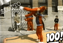 a man in a red jumpsuit is doing a trick in front of a sign that says $ lotto