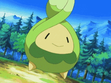 a green cartoon character with a smiling face is standing in a forest